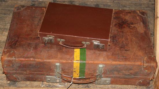 Large leather suitcase and smaller suitcase